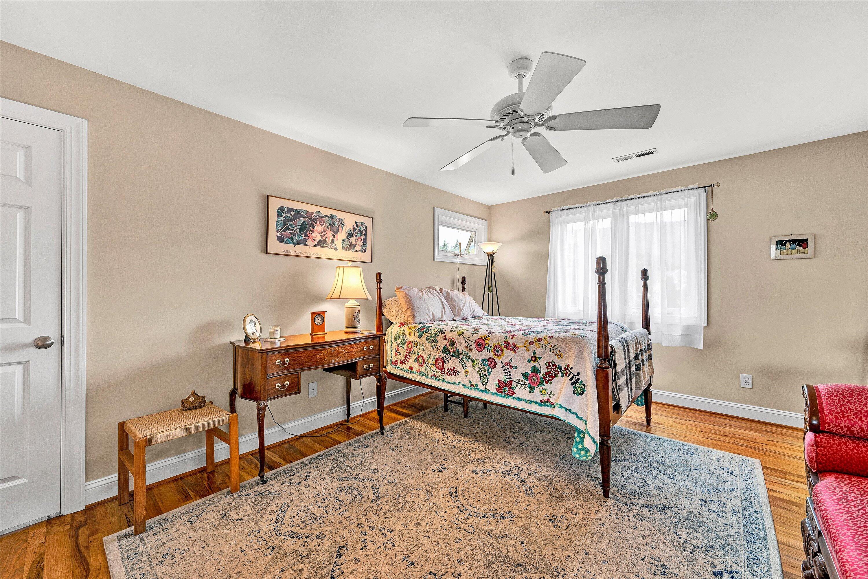 84 Green Level Road Boones Mill, VA 24065 - Photo 38 of 57 a bed room with a bed and a couch