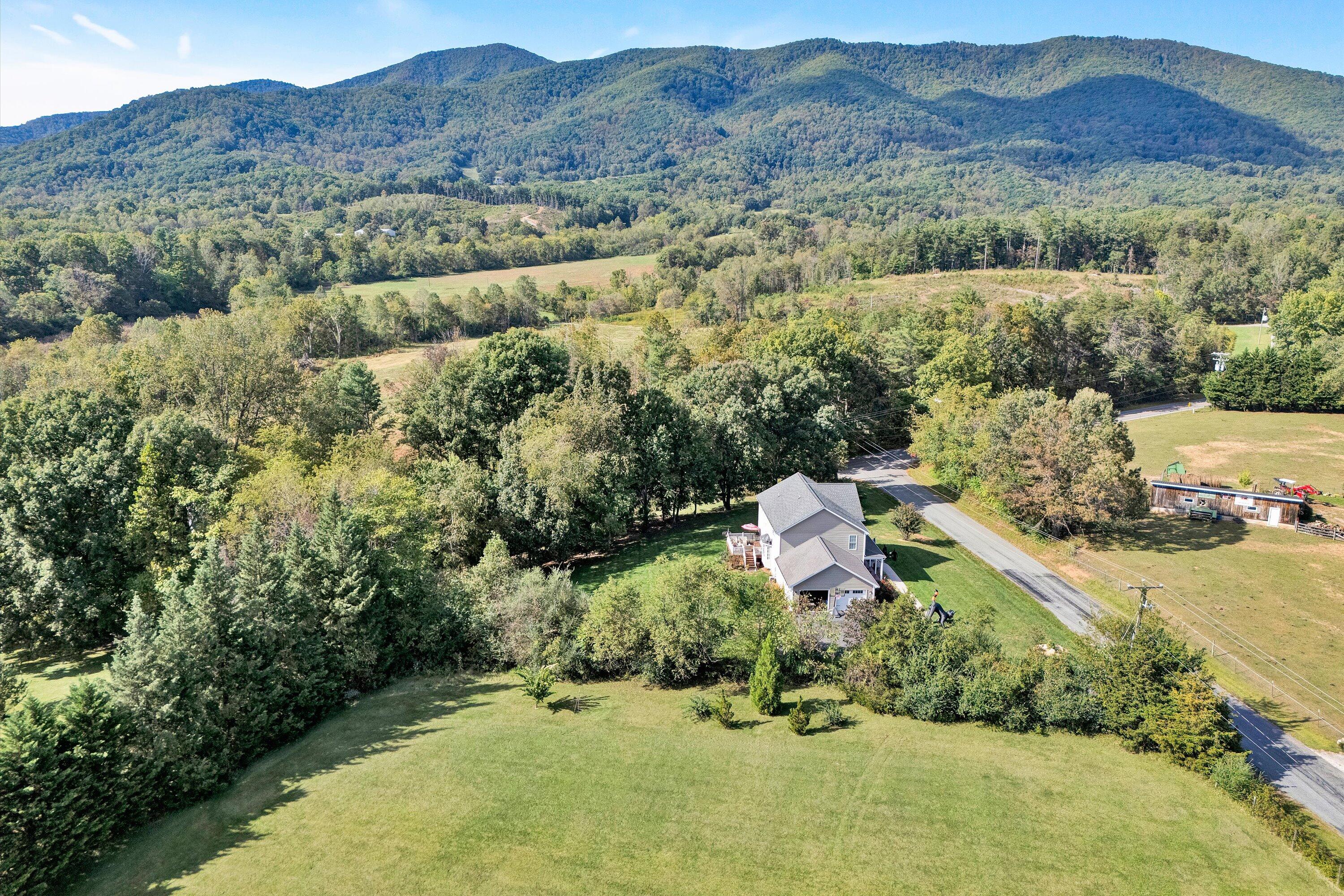 84 Green Level Road Boones Mill, VA 24065 - Photo 54 of 57 an aerial view of a house with mountain view