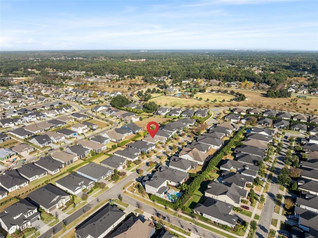 11918 Southwest 32nd Lane Gainesville, FL 32608 - Photo 11 of 44 an aerial view of residential building with parking space