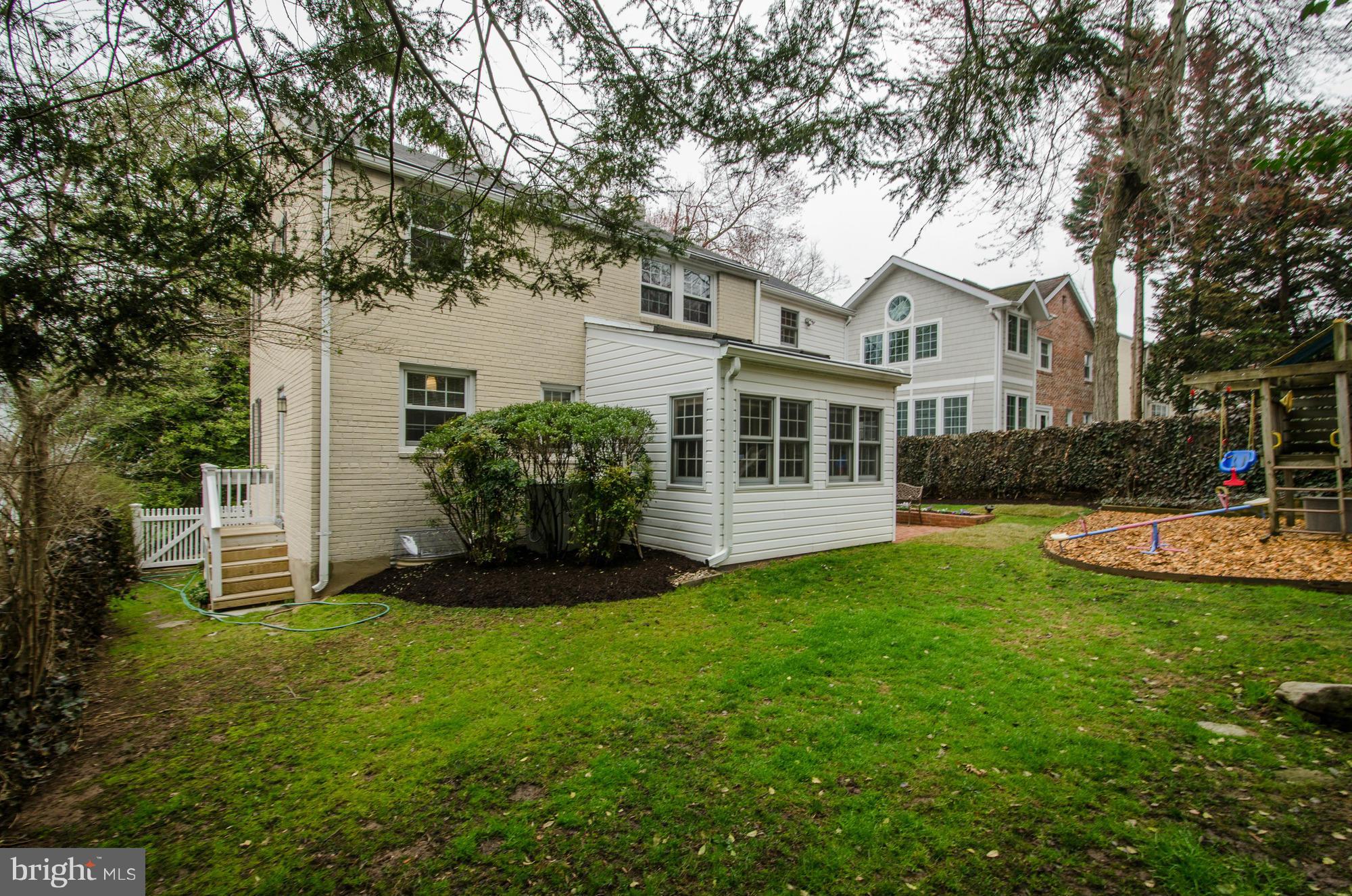 8822 Ridge Road Bethesda, MD 20817 - Photo 17 of 20 a front view of house with yard and green space