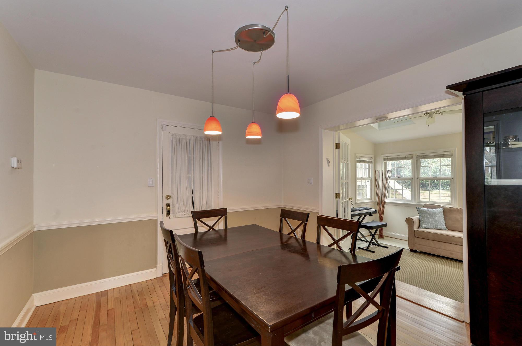 8822 Ridge Road Bethesda, MD 20817 - Photo 7 of 20 a view of a dining room with furniture and window
