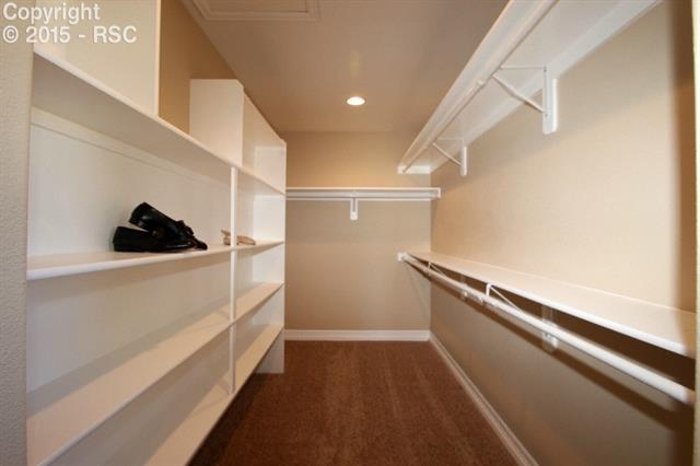 11420 Teachout Road Colorado Springs, CO 80908 - Photo 12 of 36 Large master walk-in master closet.