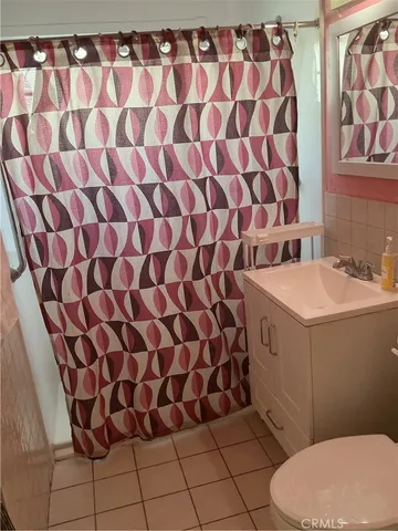 a bathroom with a sink and toilet