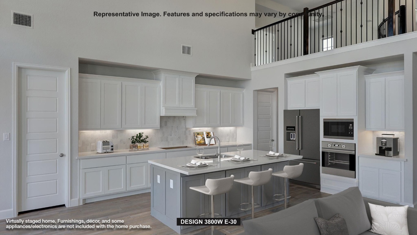 265 Leaning Rock Ridge Austin, TX 78737 - Photo 2 of 14 a kitchen with a sink appliances and cabinets
