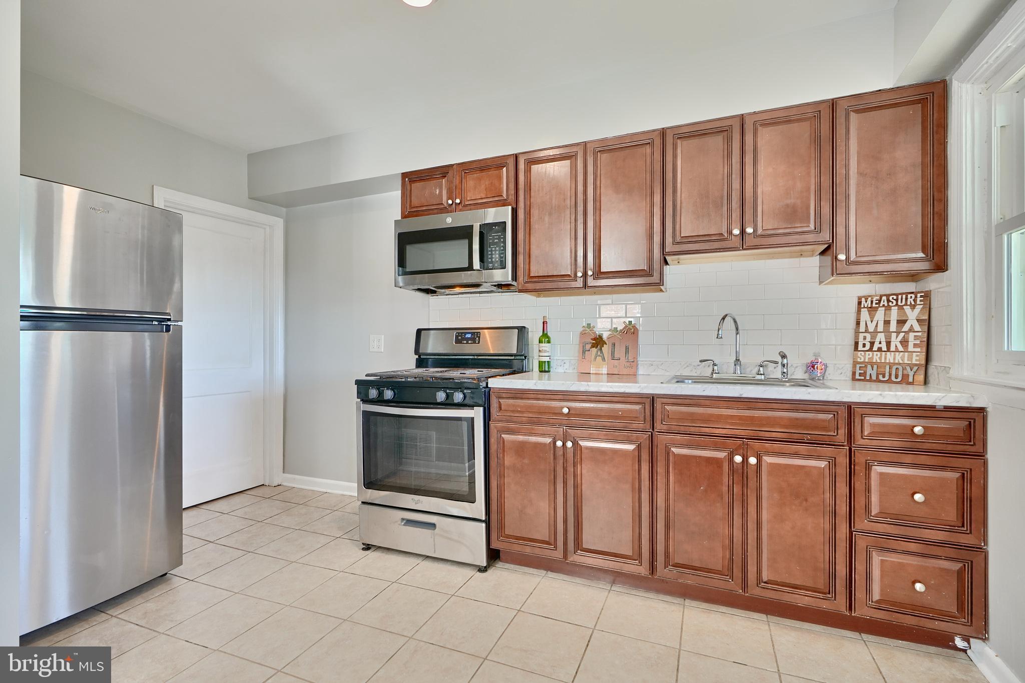 530 47th Street Baltimore, MD 21224 - Photo 11 of 29 New countertop in kitchen