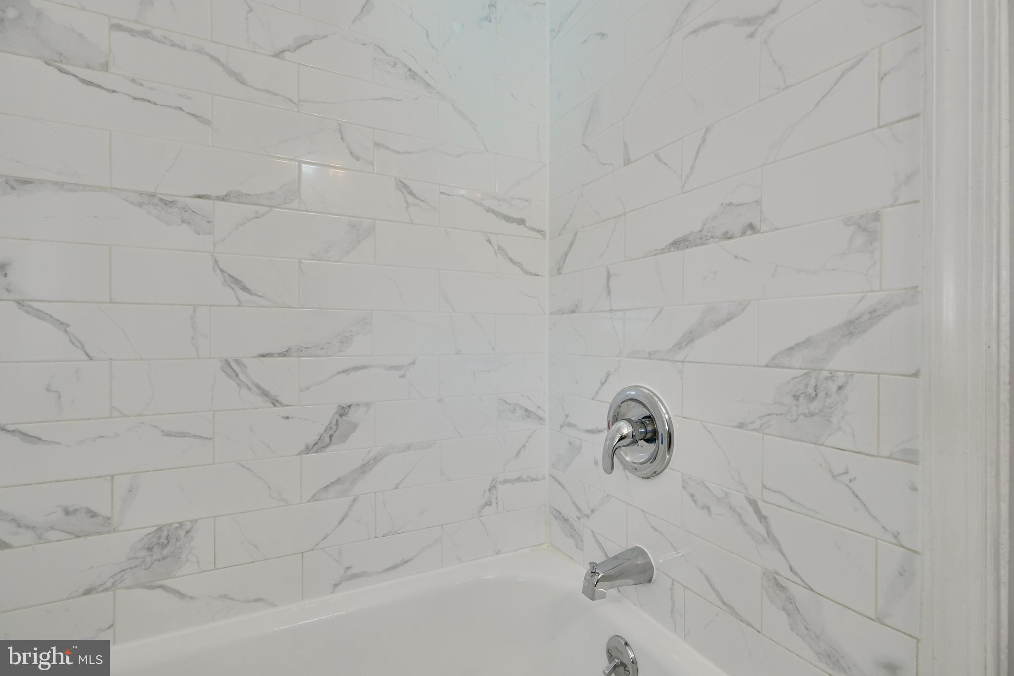 530 47th Street Baltimore, MD 21224 - Photo 26 of 29 Updated tile in bath