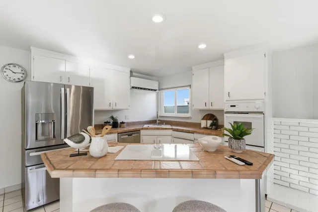 a view of a backyard with a tub