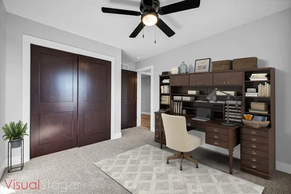 a workspace with kitchen island and a chandelier