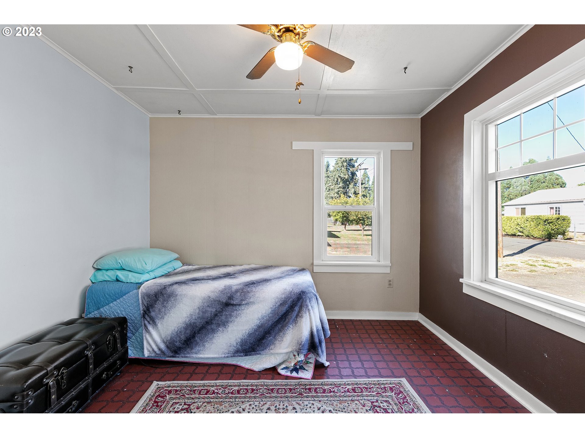 633 South 12th Street Cottage Grove, OR 97424 - Photo 18 of 30 a bedroom with a bed and a window