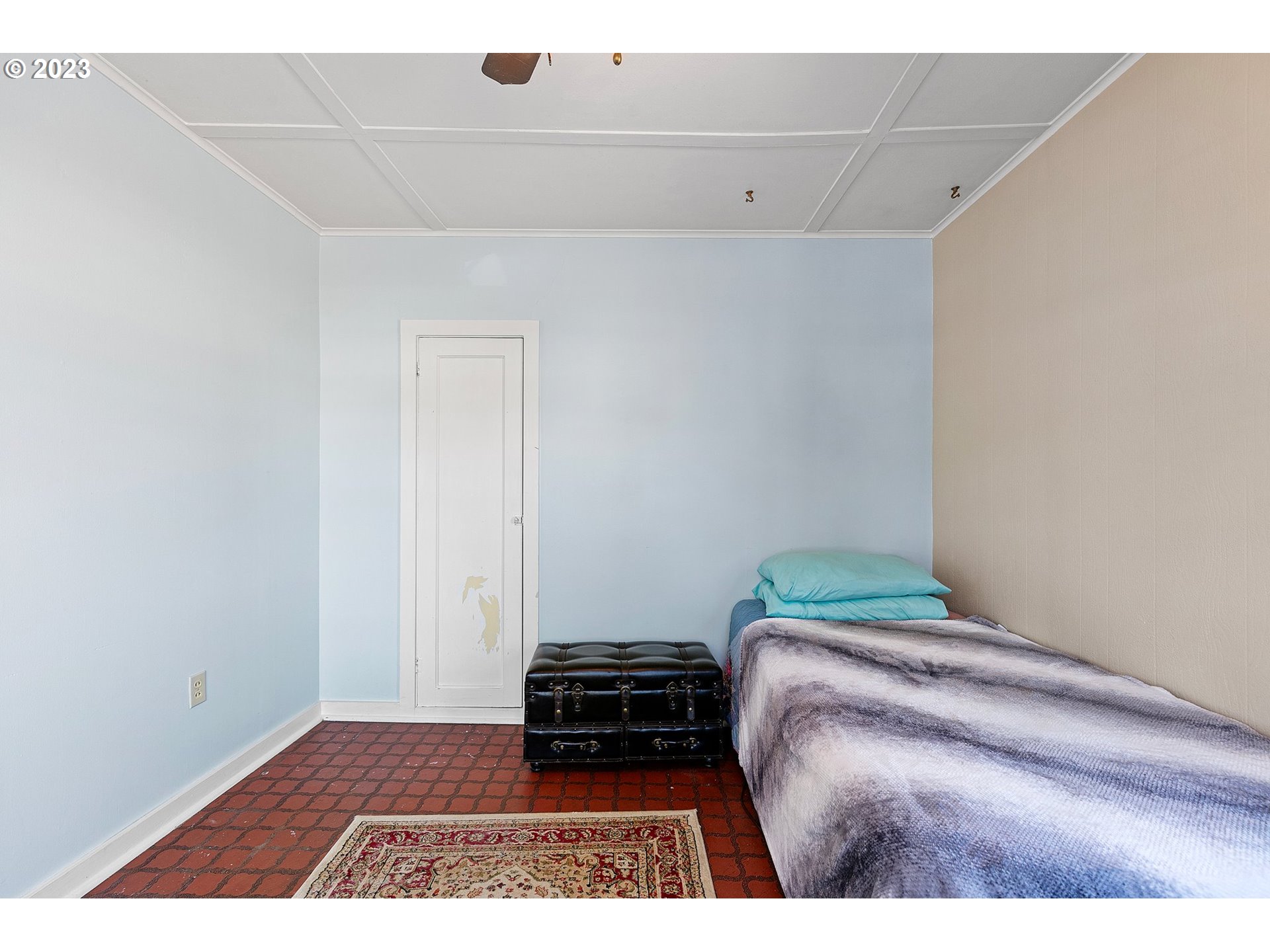 633 South 12th Street Cottage Grove, OR 97424 - Photo 19 of 30 a bedroom with a bed and a rug