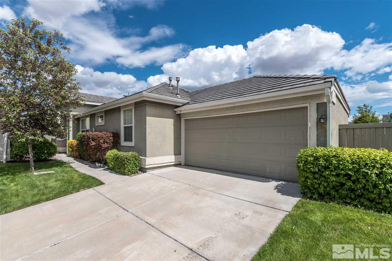 9724 Ripple Way Reno, NV 89521 - Photo 1 of 19 a front view of house with garden