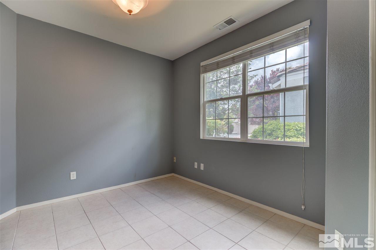 9724 Ripple Way Reno, NV 89521 - Photo 11 of 19 a view of an empty room with a window