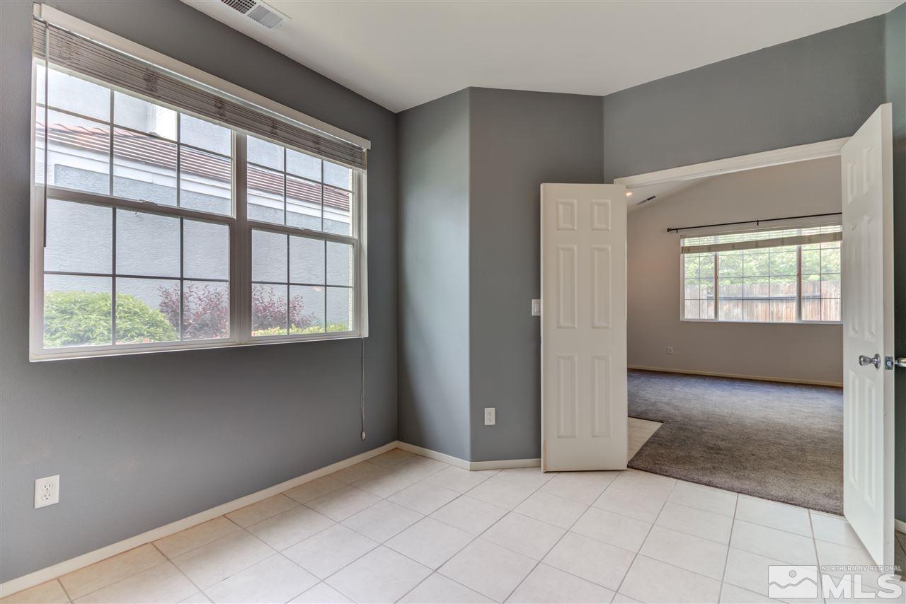 9724 Ripple Way Reno, NV 89521 - Photo 12 of 19 an empty room with windows