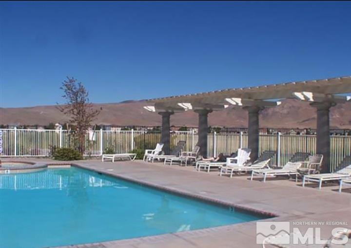 9724 Ripple Way Reno, NV 89521 - Photo 19 of 19 a view of a swimming pool with outdoor seating