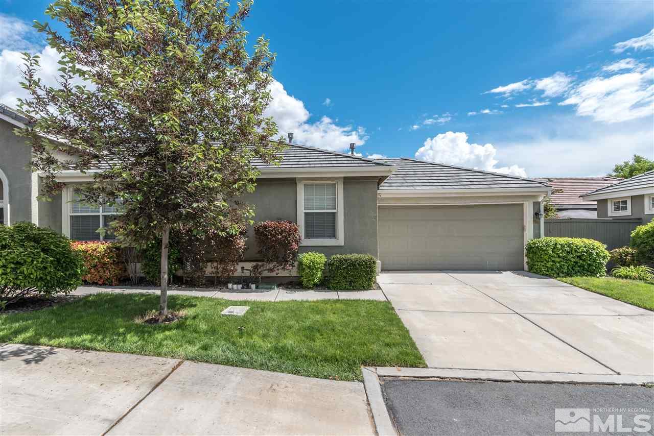 9724 Ripple Way Reno, NV 89521 - Photo 2 of 19 front view of house with a yard