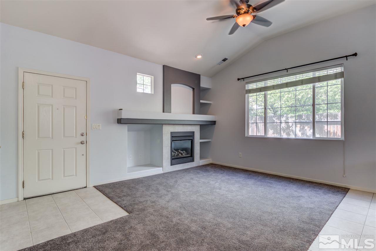 9724 Ripple Way Reno, NV 89521 - Photo 5 of 19 a view of an empty room with a window