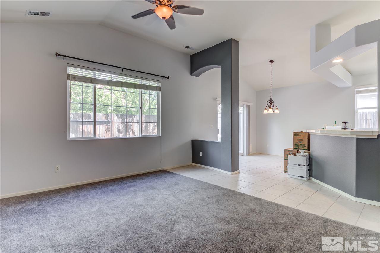 9724 Ripple Way Reno, NV 89521 - Photo 6 of 19 a view of an empty room with a window