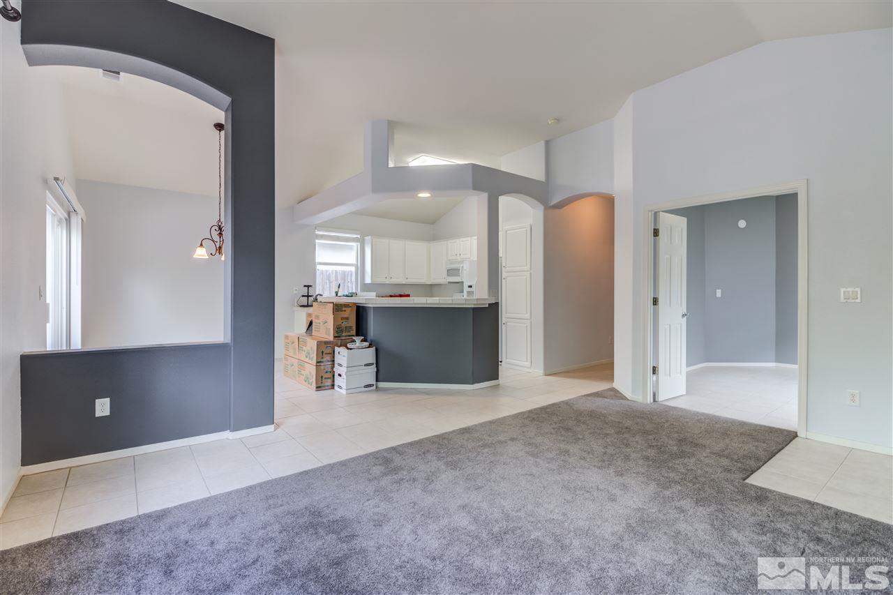 9724 Ripple Way Reno, NV 89521 - Photo 7 of 19 wooden floor and a cabinet in a room