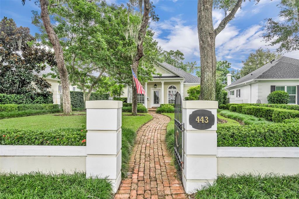 443 Beloit Avenue Winter Park, FL 32789 - Photo 1 of 1 a view of a white house with a sink and yard