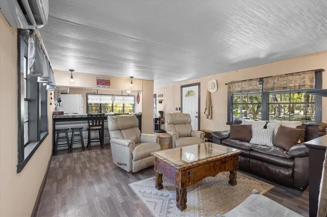 a living room with furniture and a table