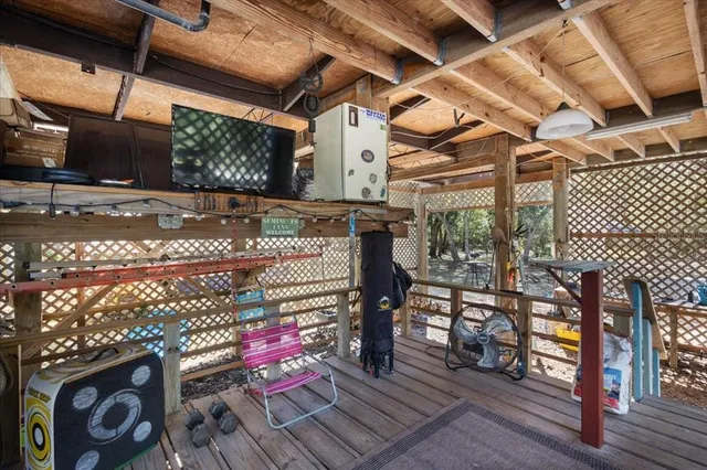a view of a chairs and table in a patio