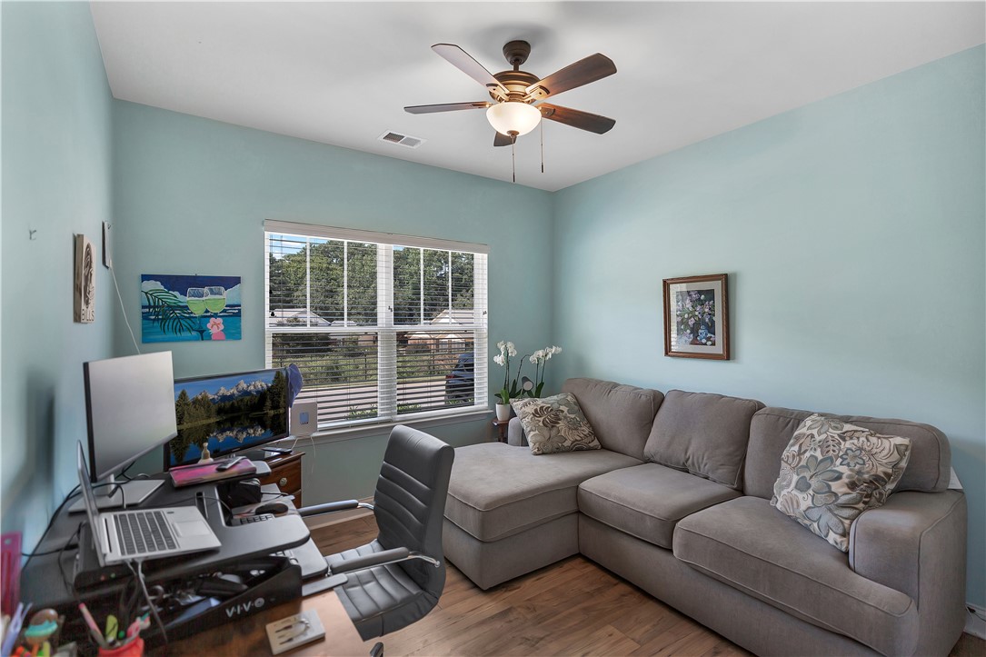121 Ventura Street Anderson, SC 29621 - Photo 22 of 32 Natural light floods this versatile bonus room, perfect for a home office or relaxation.