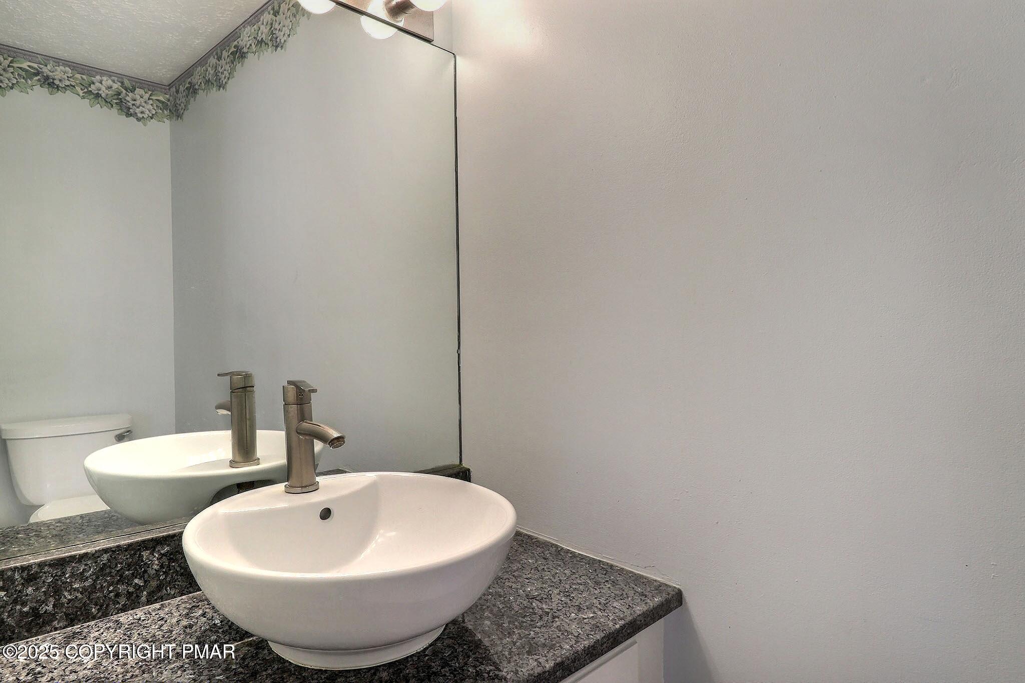 641 Long Mountain Road Effort, PA 18330 - Photo 28 of 41 a bathroom with a sink and a mirror