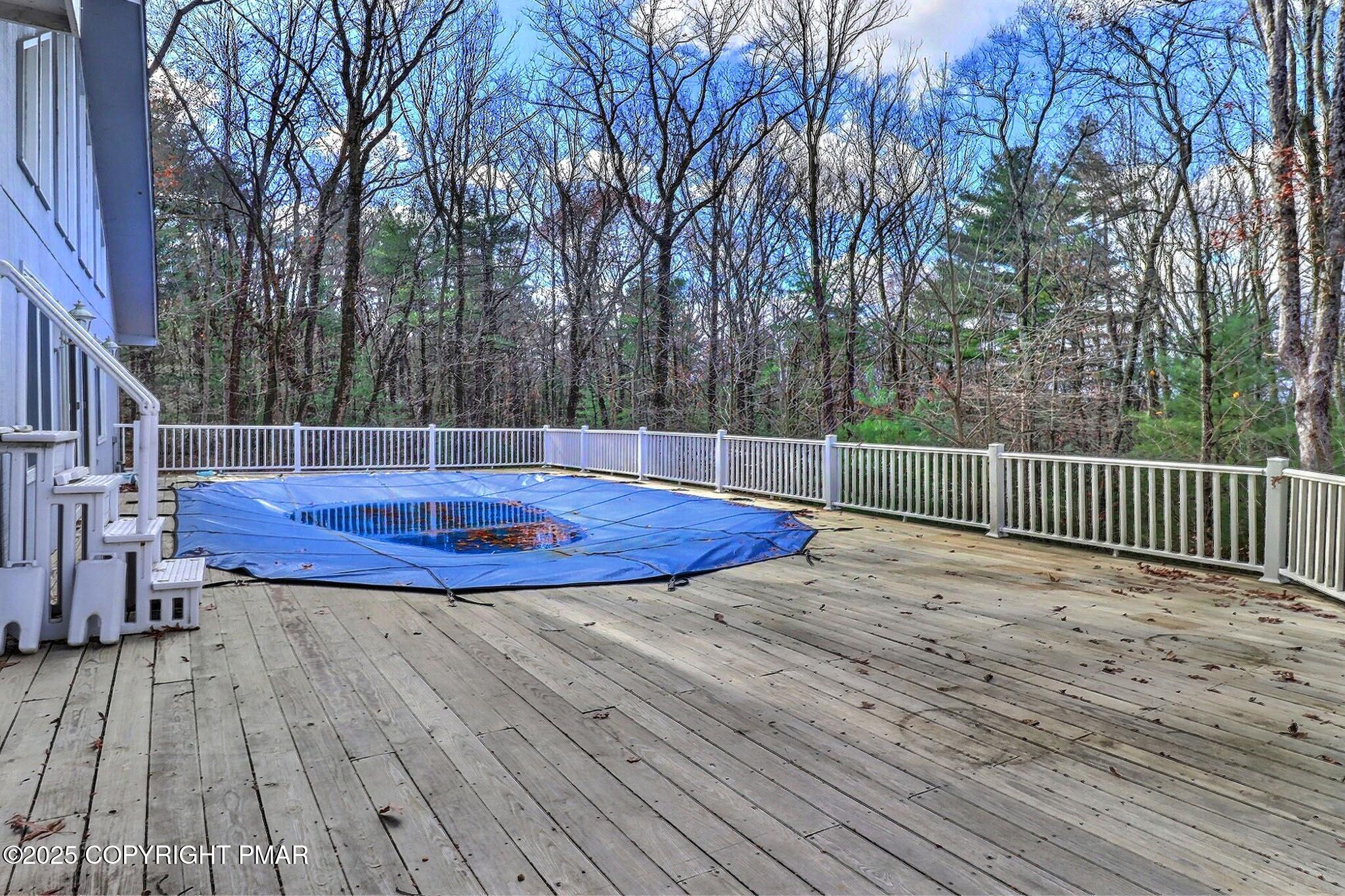 641 Long Mountain Road Effort, PA 18330 - Photo 35 of 41 a view of a backyard with a wooden deck