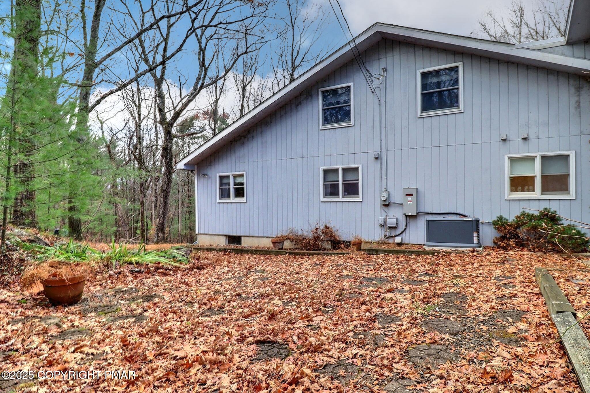 641 Long Mountain Road Effort, PA 18330 - Photo 5 of 41 a front view of a house with a yard