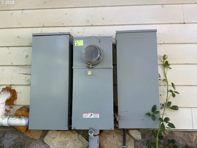 a close view of a utility room with washer and dryer