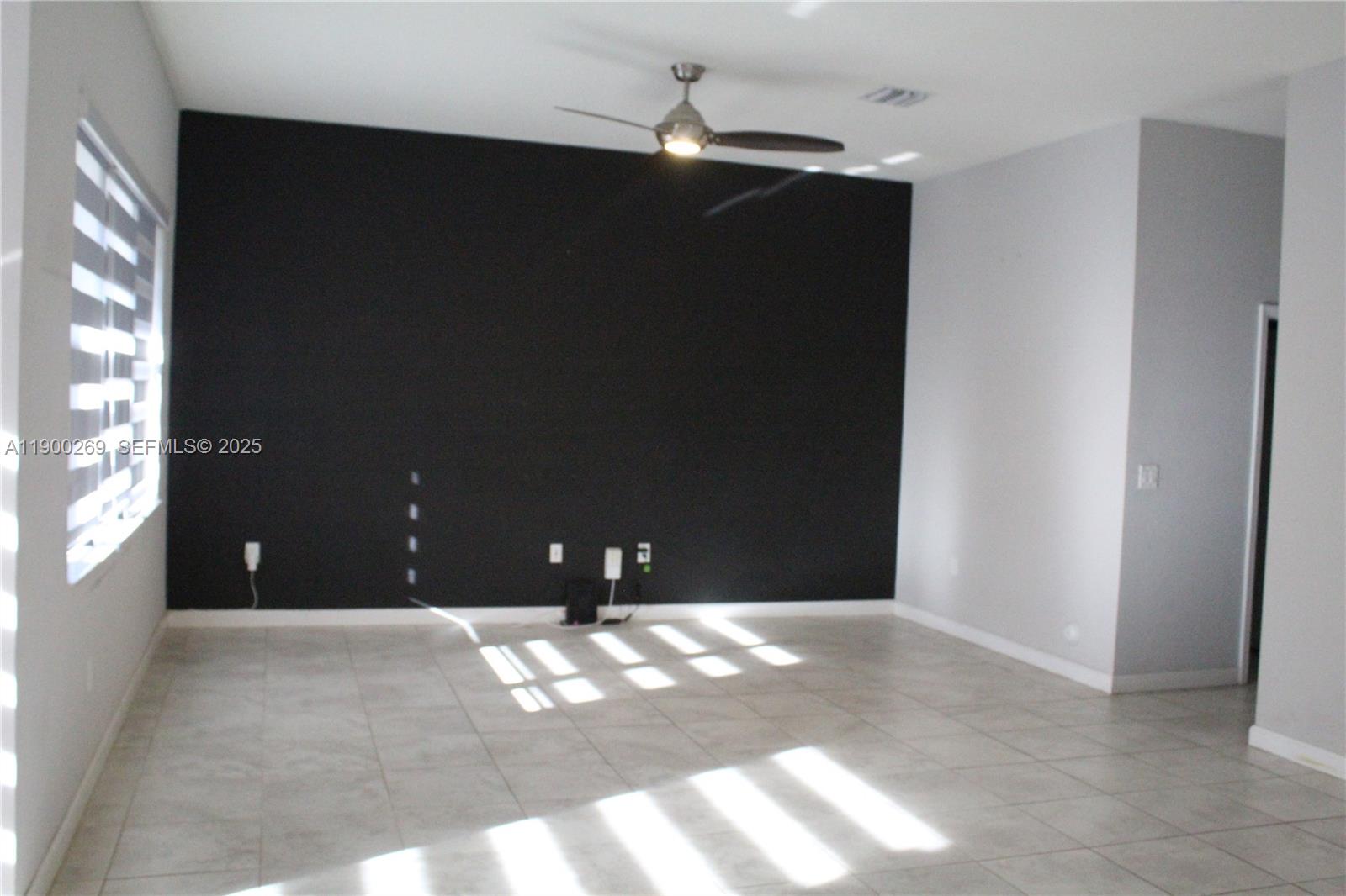 25096 Southwest 118th Avenue, Unit 25096 Homestead, FL 33032 - Photo 11 of 78 a view of an empty room