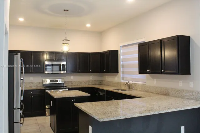 a view of a livingroom with a staircase