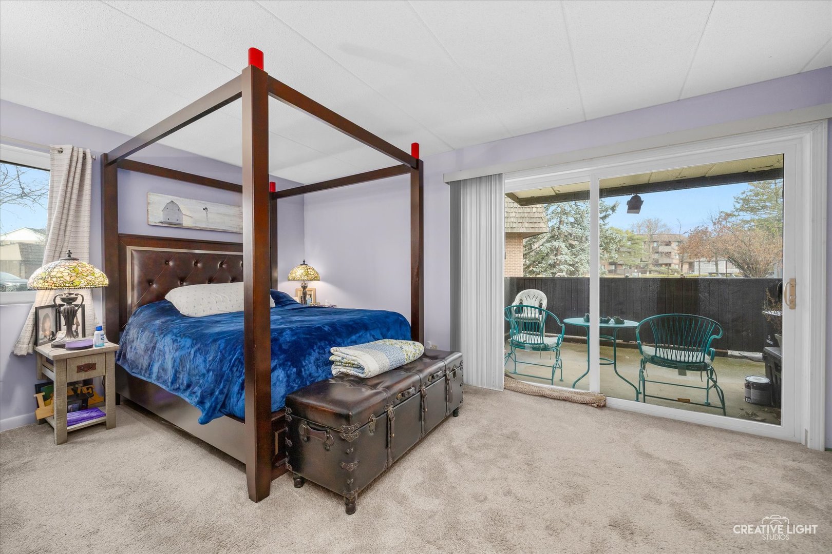 491 Timber Ridge Drive, Unit 102 Carol Stream, IL 60188 - Photo 11 of 18 a bed room with a bed and a window