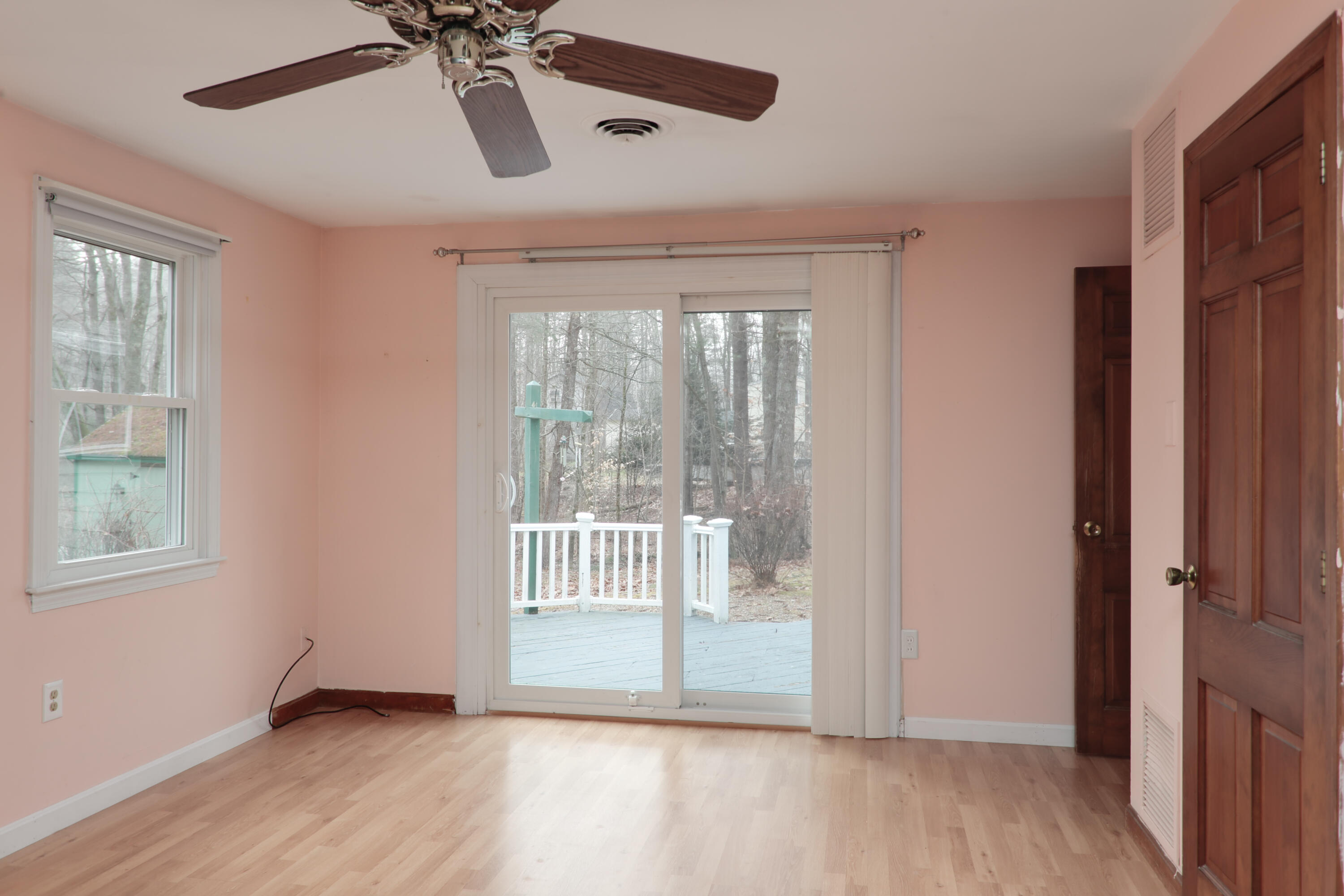 147 Governor Hill Road Eliot, ME 03903 - Photo 10 of 40 primary bedroom with sliders to deck