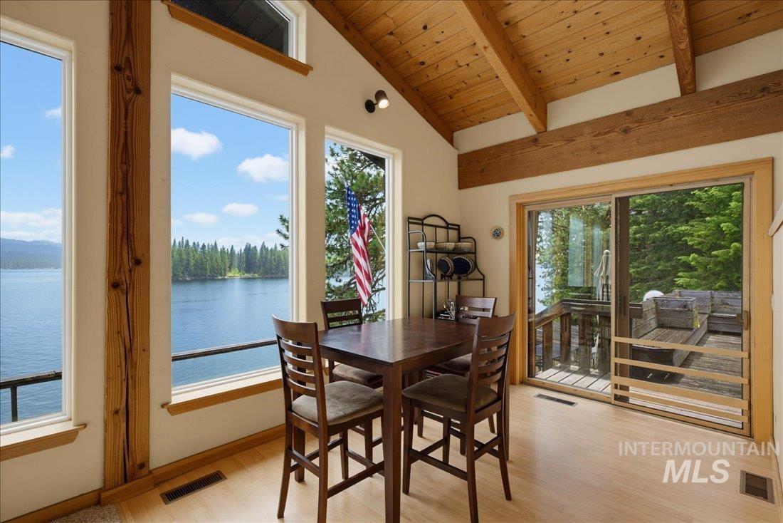 3800 Warren Wagon Road McCall, ID 83638 - Photo 16 of 50 Wood-finish flooring throughout, complemented by a vaulted wood-beam ceiling