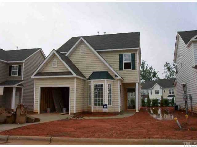 8431 Tie Stone Way Raleigh, NC 27613 - Photo 1 of 1 a front view of a house with a yard