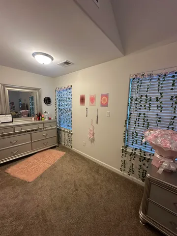 a view of room with gym equipment