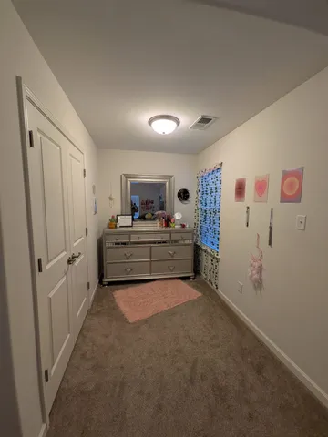 a room with furniture and window