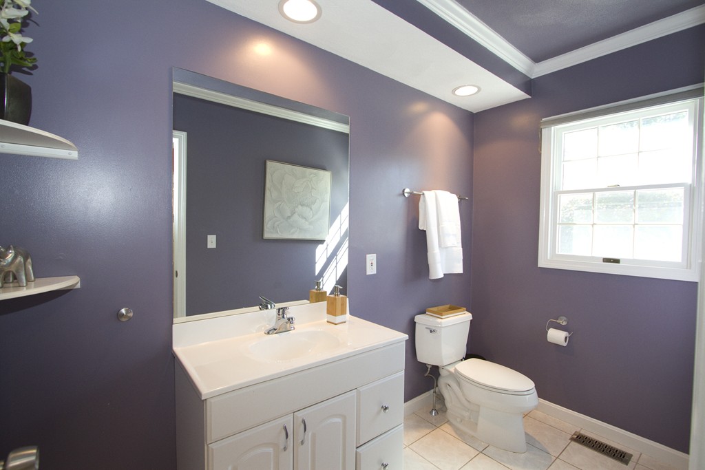 2 Campbell Road Middleton, MA 01949 - Photo 12 of 30 a bathroom with a toilet a sink and mirror