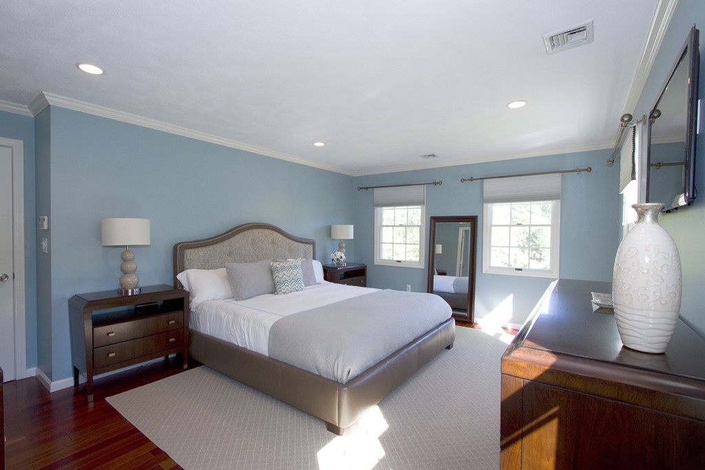 2 Campbell Road Middleton, MA 01949 - Photo 13 of 30 a bedroom with a bed and a lamp on table