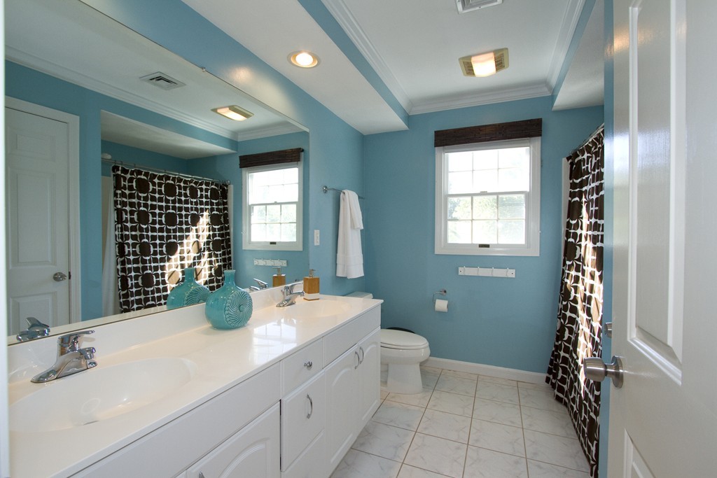 2 Campbell Road Middleton, MA 01949 - Photo 17 of 30 a spacious bathroom with a double vanity sink toilet and a tub