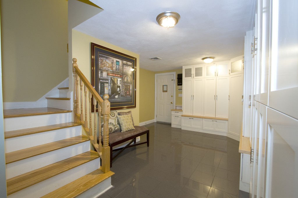 2 Campbell Road Middleton, MA 01949 - Photo 19 of 30 a view of entryway with wooden floor and stairs