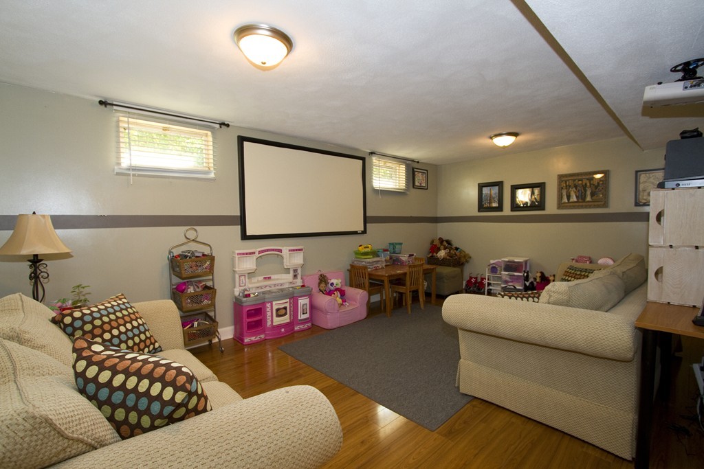 2 Campbell Road Middleton, MA 01949 - Photo 21 of 30 a living room with furniture and a couch