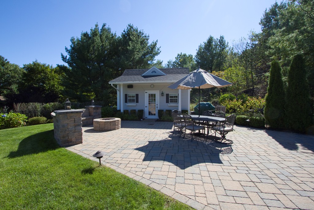 2 Campbell Road Middleton, MA 01949 - Photo 23 of 30 a view of a house with backyard sitting area and garden