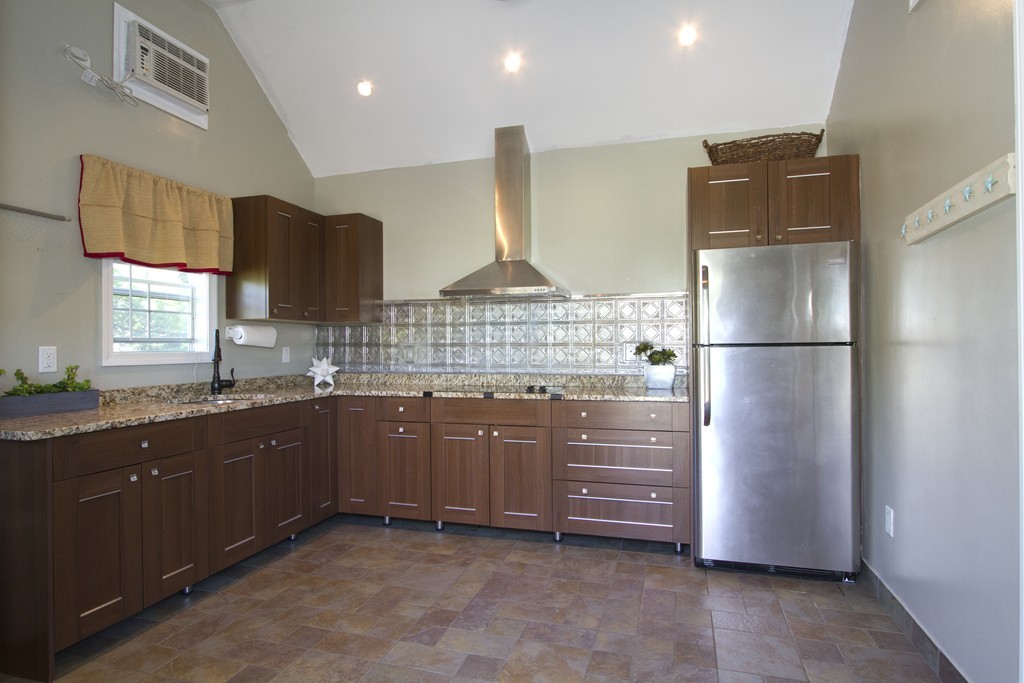 2 Campbell Road Middleton, MA 01949 - Photo 24 of 30 a kitchen with stainless steel appliances granite countertop a refrigerator and a sink