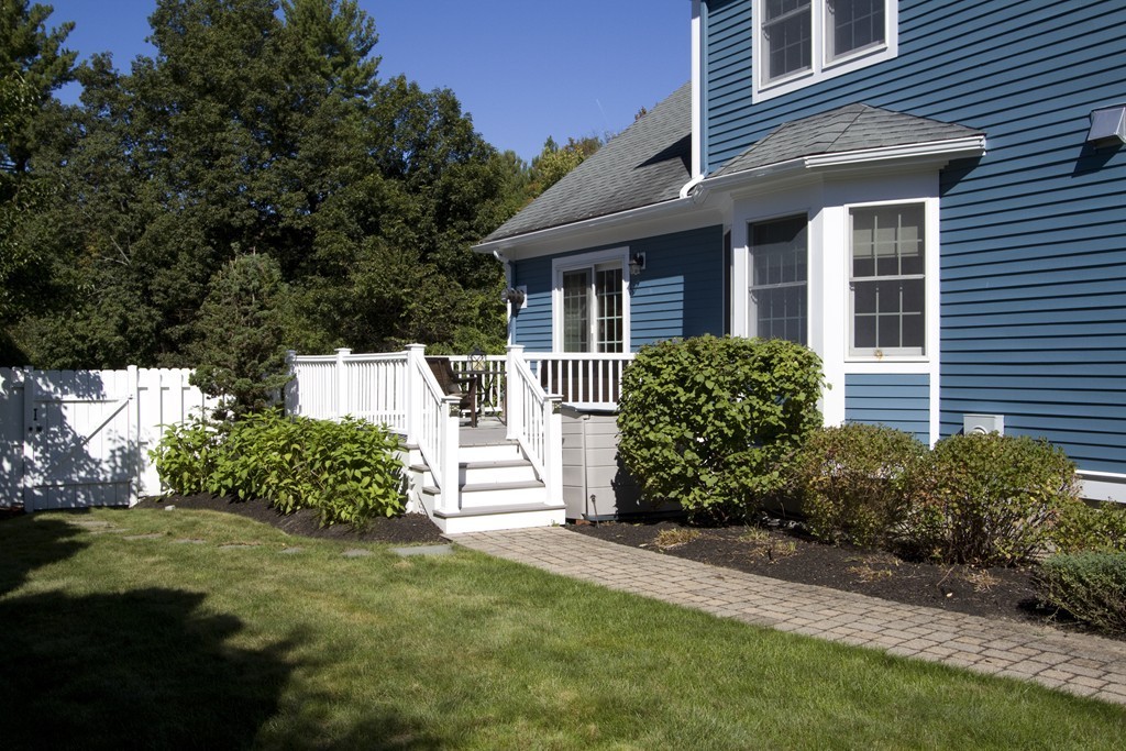 2 Campbell Road Middleton, MA 01949 - Photo 29 of 30 a front view of a house with a yard