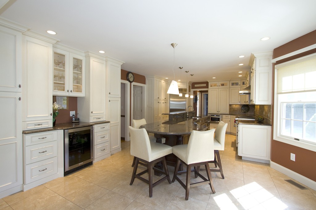 2 Campbell Road Middleton, MA 01949 - Photo 3 of 30 a large kitchen with a table and chairs in it