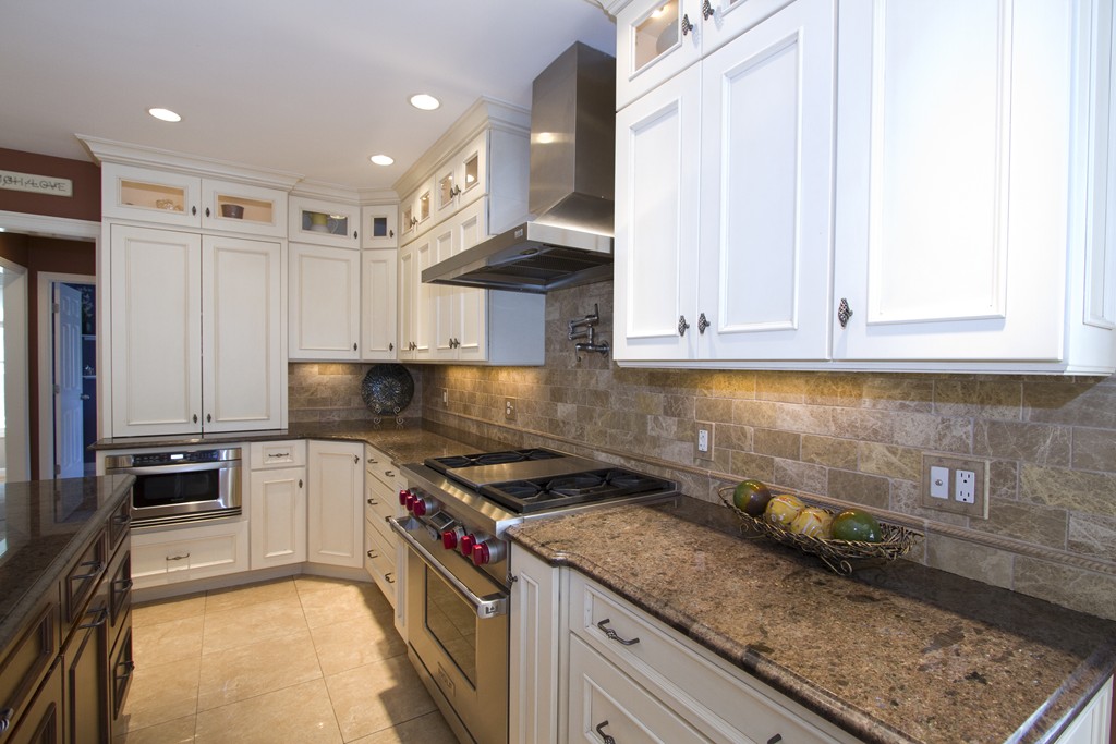2 Campbell Road Middleton, MA 01949 - Photo 4 of 30 a kitchen with granite countertop a sink a stove and cabinets