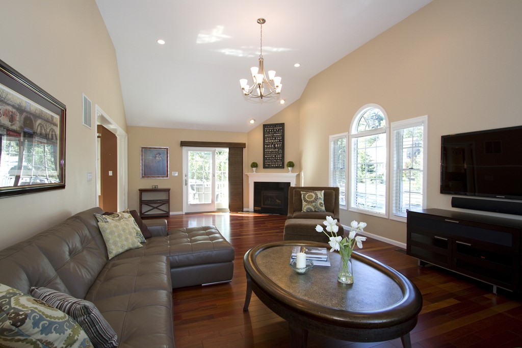 2 Campbell Road Middleton, MA 01949 - Photo 7 of 30 a living room with fireplace furniture and a flat screen tv