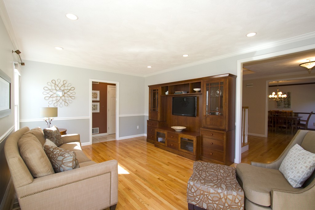 2 Campbell Road Middleton, MA 01949 - Photo 10 of 30 a living room with furniture and a flat screen tv